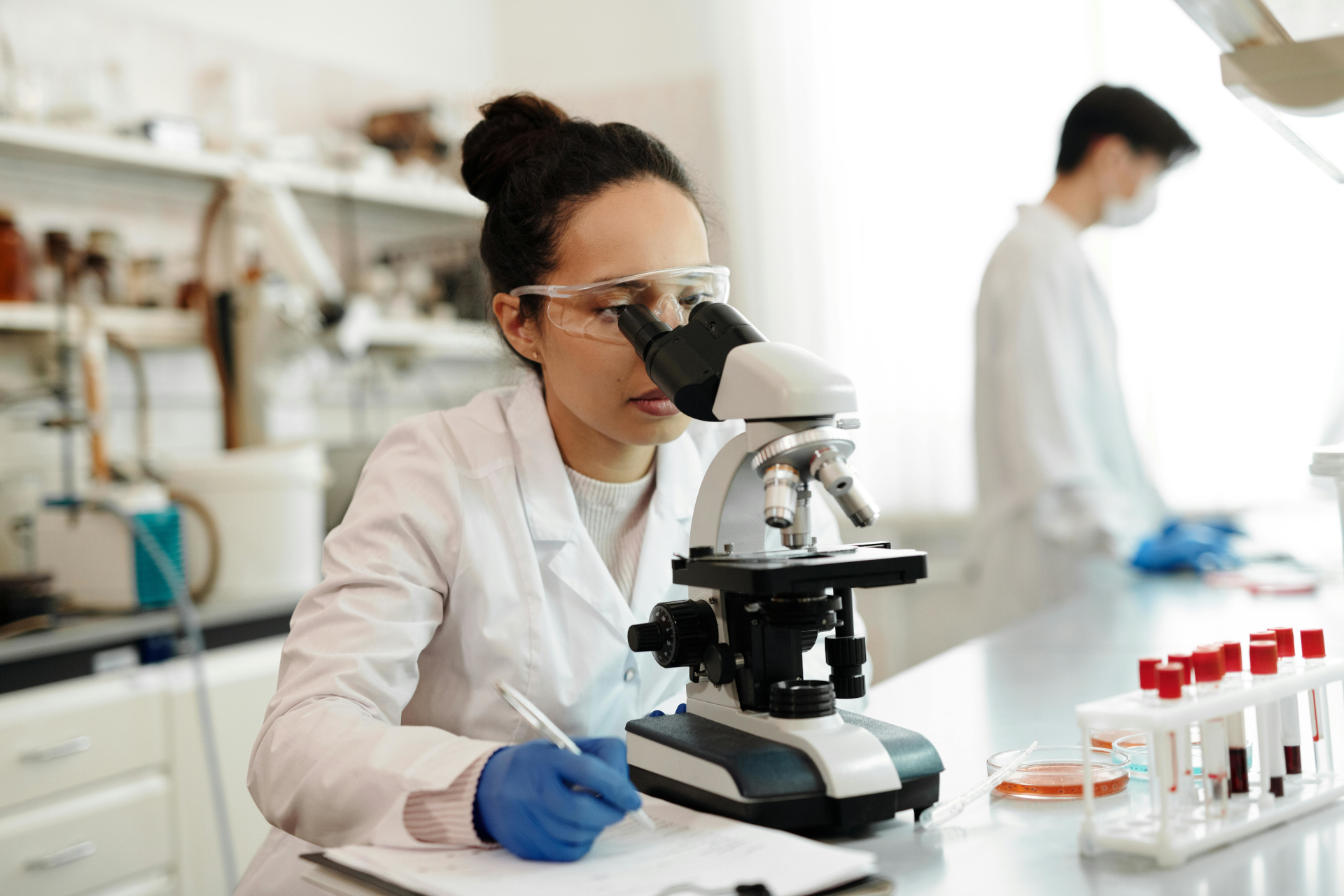 Advanced laboratory setup with genetic sequencing equipment, representing precision oncology services at Sapiens Genetics."